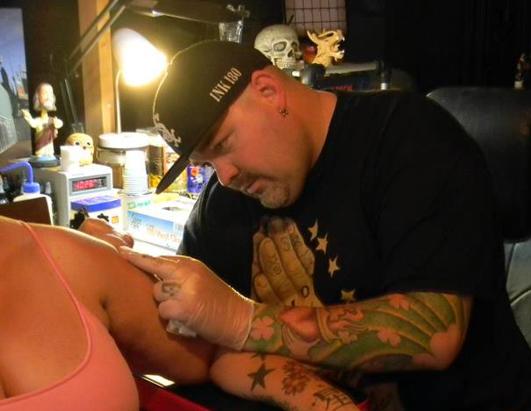 The idea of free tattoos came from his former warehouse employees. "They would say, 'I wish I could get rid of my tattoos. I'm tired of getting judged,'" Baker told ABC News.com. "And I decided that's my calling." (Lisa Baker)